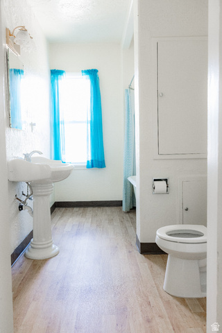 69 South Main Street Manti, UT 84642 - Photo 35 of 44 Bathroom featuring wood-finish flooring and a pedestal sink