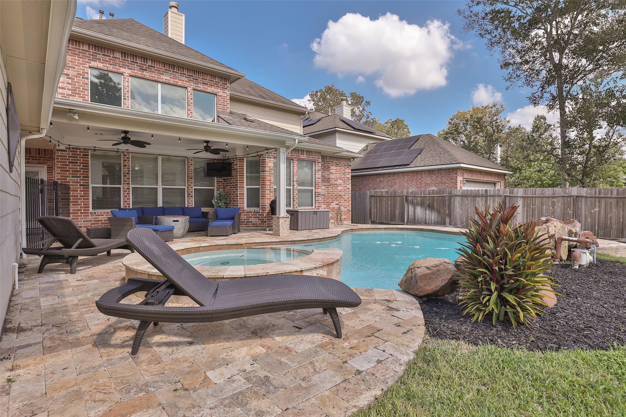 10514 Spice Ridge Row Missouri City, TX 77459 - Photo 41 of 43 a view of a house with backyard and sitting area