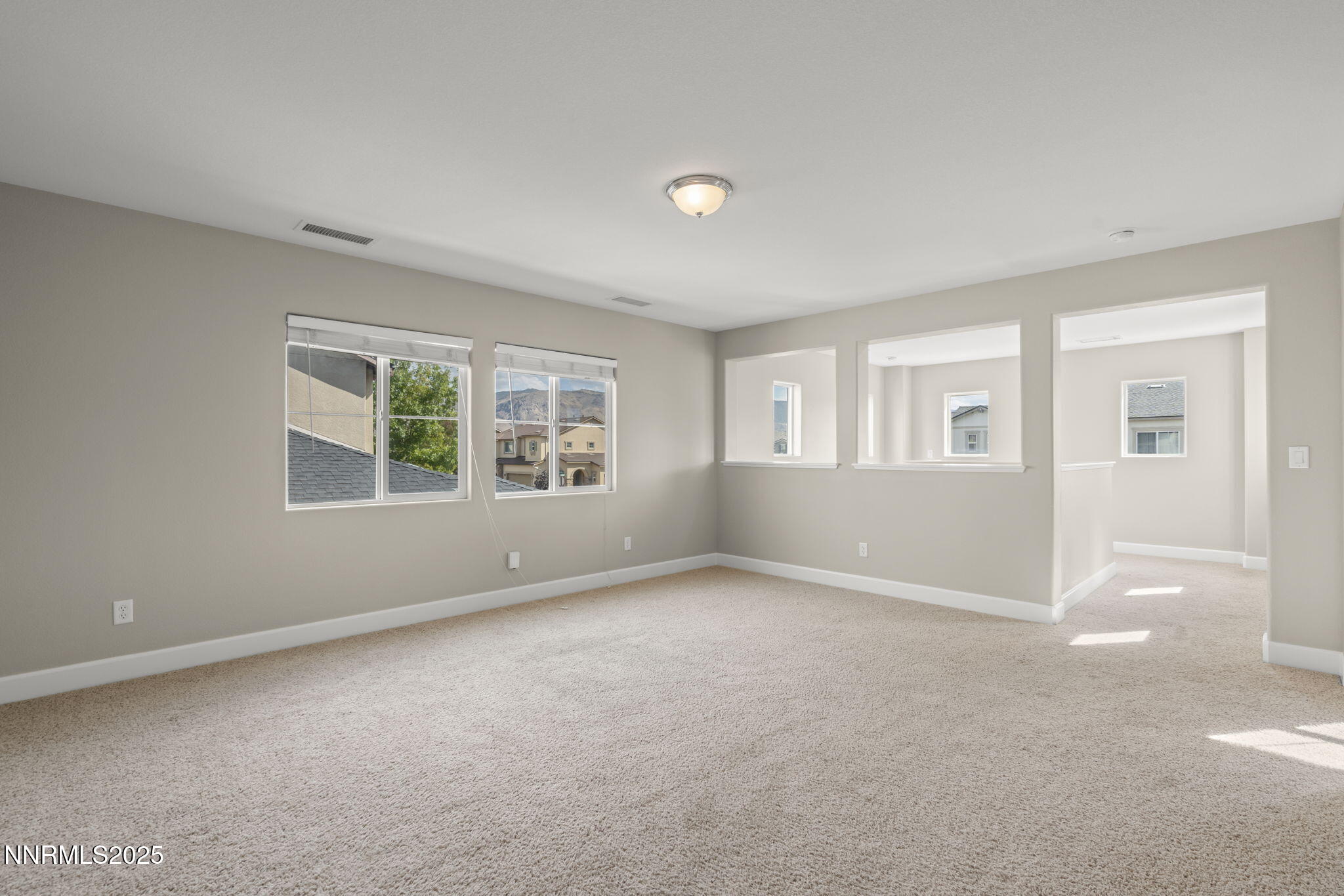 1955 Echo Valley Parkway Reno, NV 89521 - Photo 12 of 26 a view of an empty room with a window