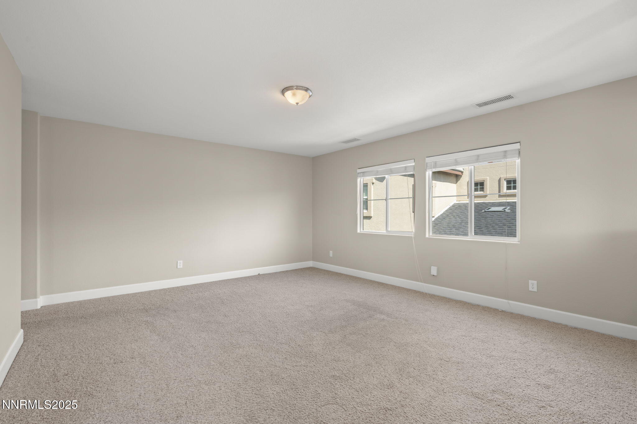 1955 Echo Valley Parkway Reno, NV 89521 - Photo 13 of 26 an empty room with windows