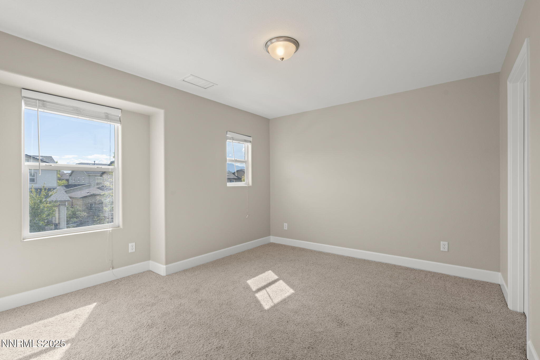 1955 Echo Valley Parkway Reno, NV 89521 - Photo 17 of 26 an empty room with a window