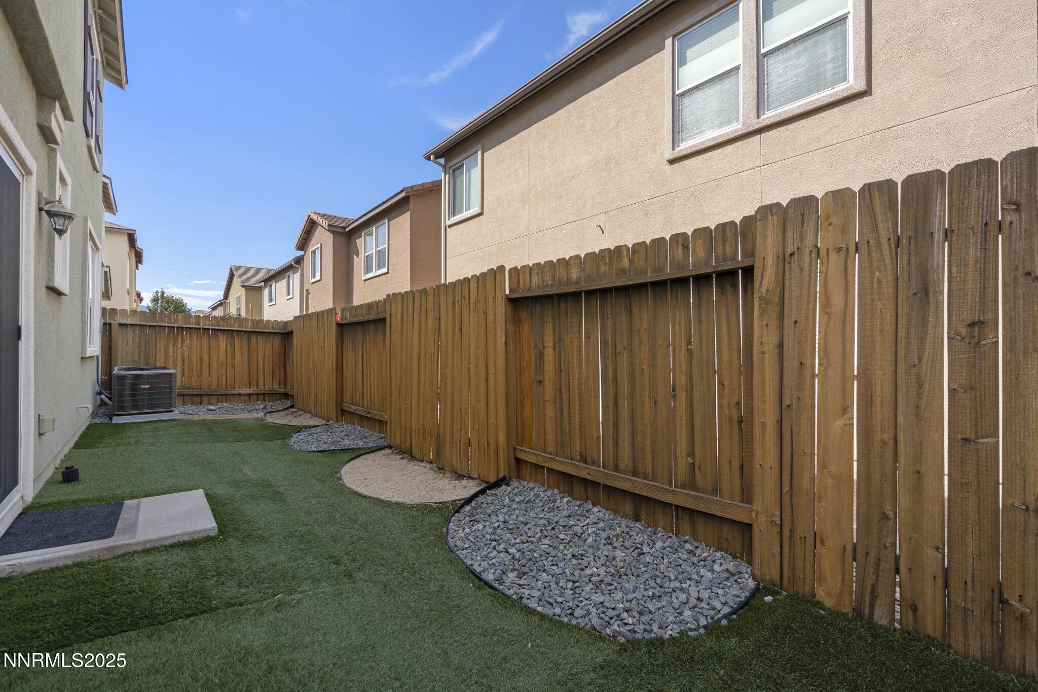 1955 Echo Valley Parkway Reno, NV 89521 - Photo 22 of 26 a view of a backyard with barn and a trees