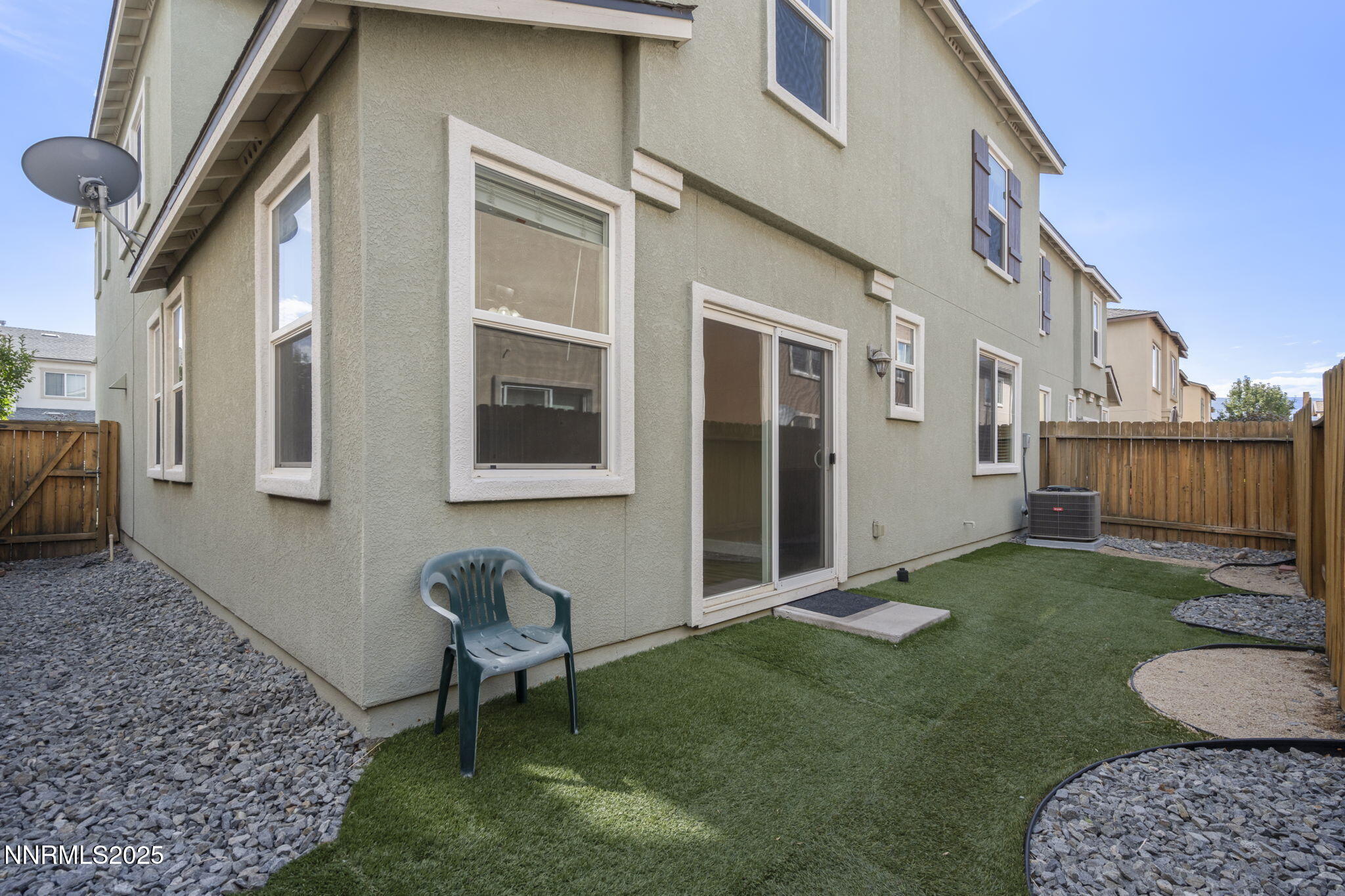 1955 Echo Valley Parkway Reno, NV 89521 - Photo 23 of 26 a backyard of a house with seating space