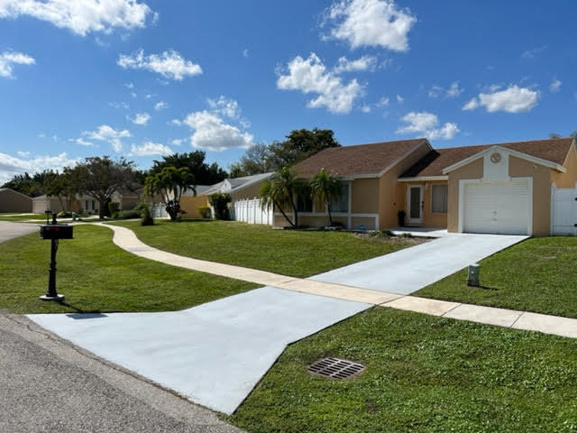 9957 Robins Nest Road Boca Raton, FL 33496 - Photo 4 of 22 Front of the house