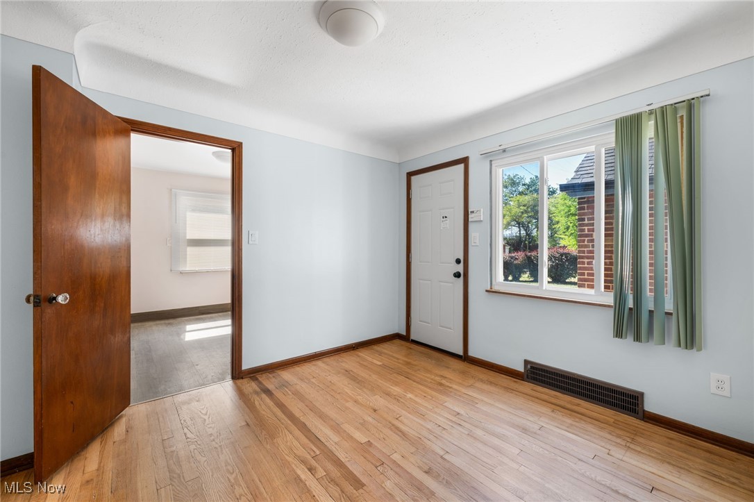 18122 Nottingham Road Cleveland, OH 44119 - Photo 7 of 29 Dining room with light wood finished floors and baseboards