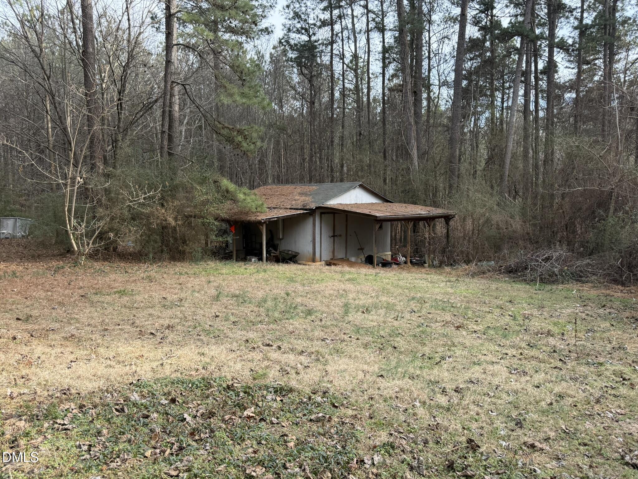 4749 Buckhorn Road Sanford, NC 27330 - Photo 17 of 18 a front view of a house with a yard