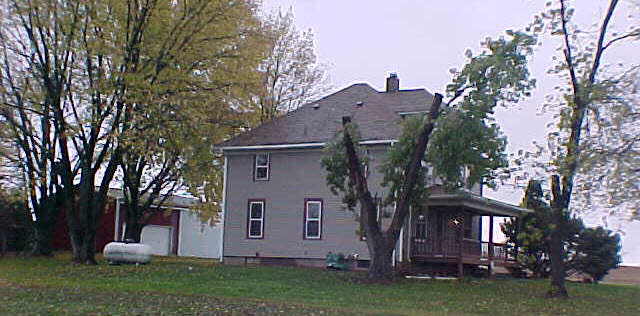 10564 Ridott Road Pecatonica, IL 61063 - Photo 4 of 5 a view of a house with backyard