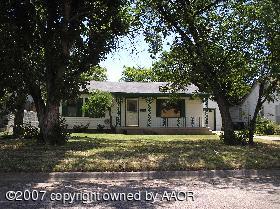 4105 South Bonham Street Amarillo, TX 79110 - Photo 1 of 5 a front view of a house with a garden