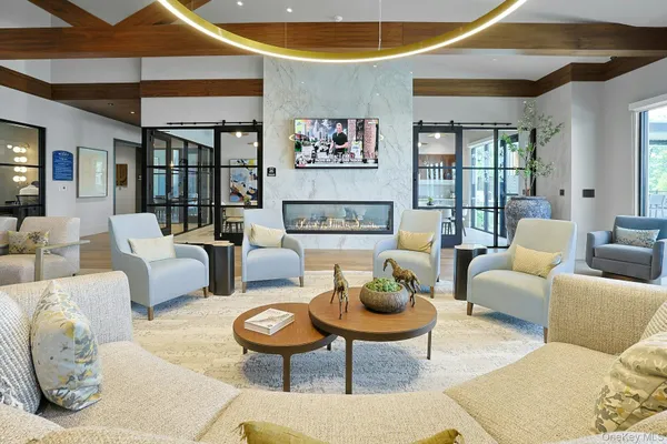 a living room with furniture and a table