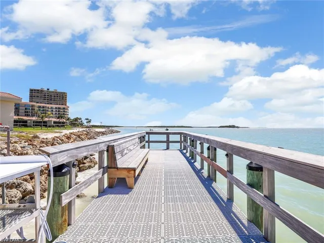a view of balcony with wooden floor