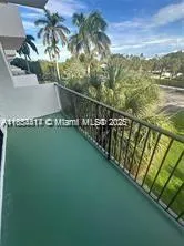 a view of balcony with ocean view