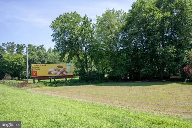 a view of a lake and a yard