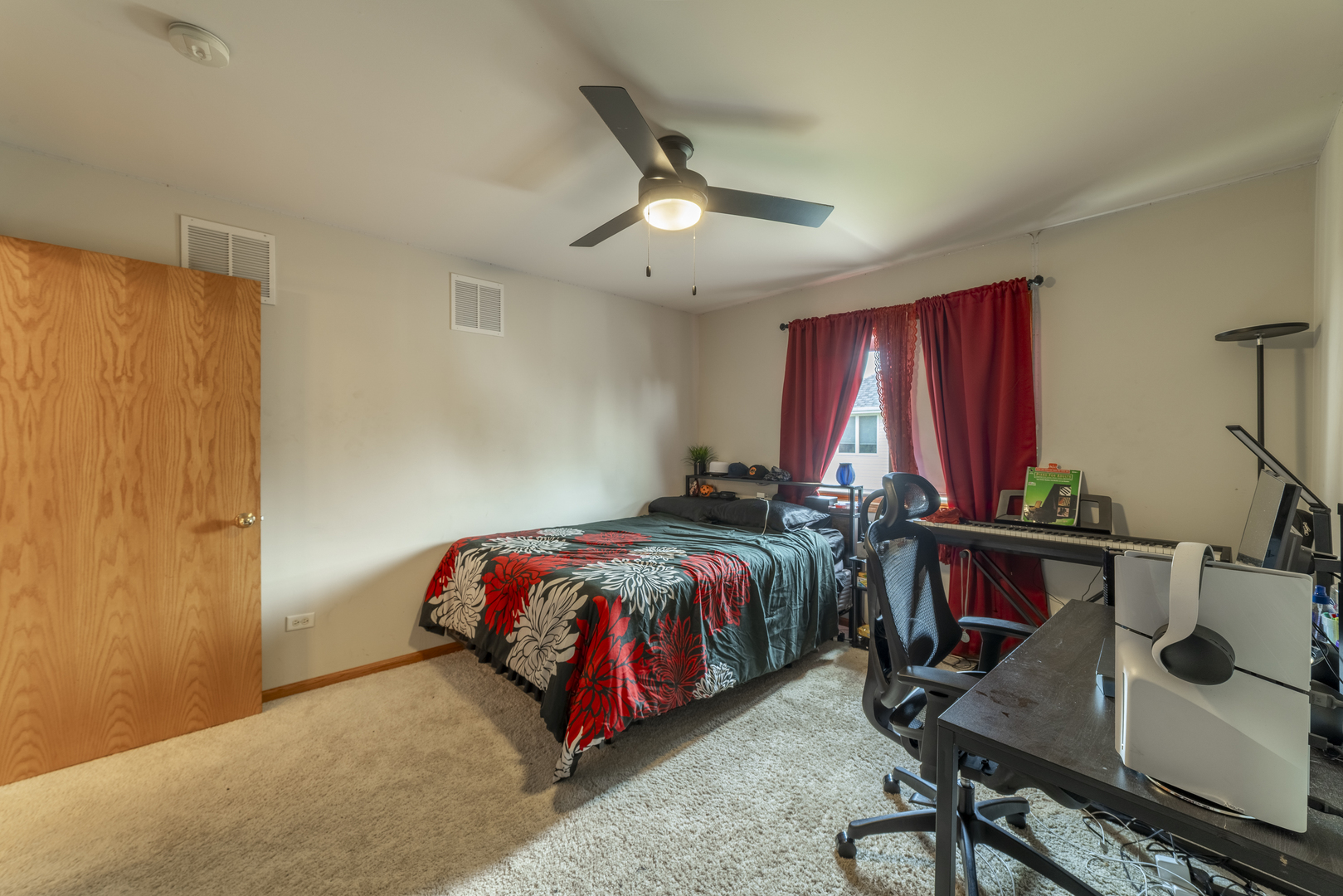 1071 Yamma Ridge New Lenox, IL 60451 - Photo 38 of 51 a bedroom with bed and a chandelier
