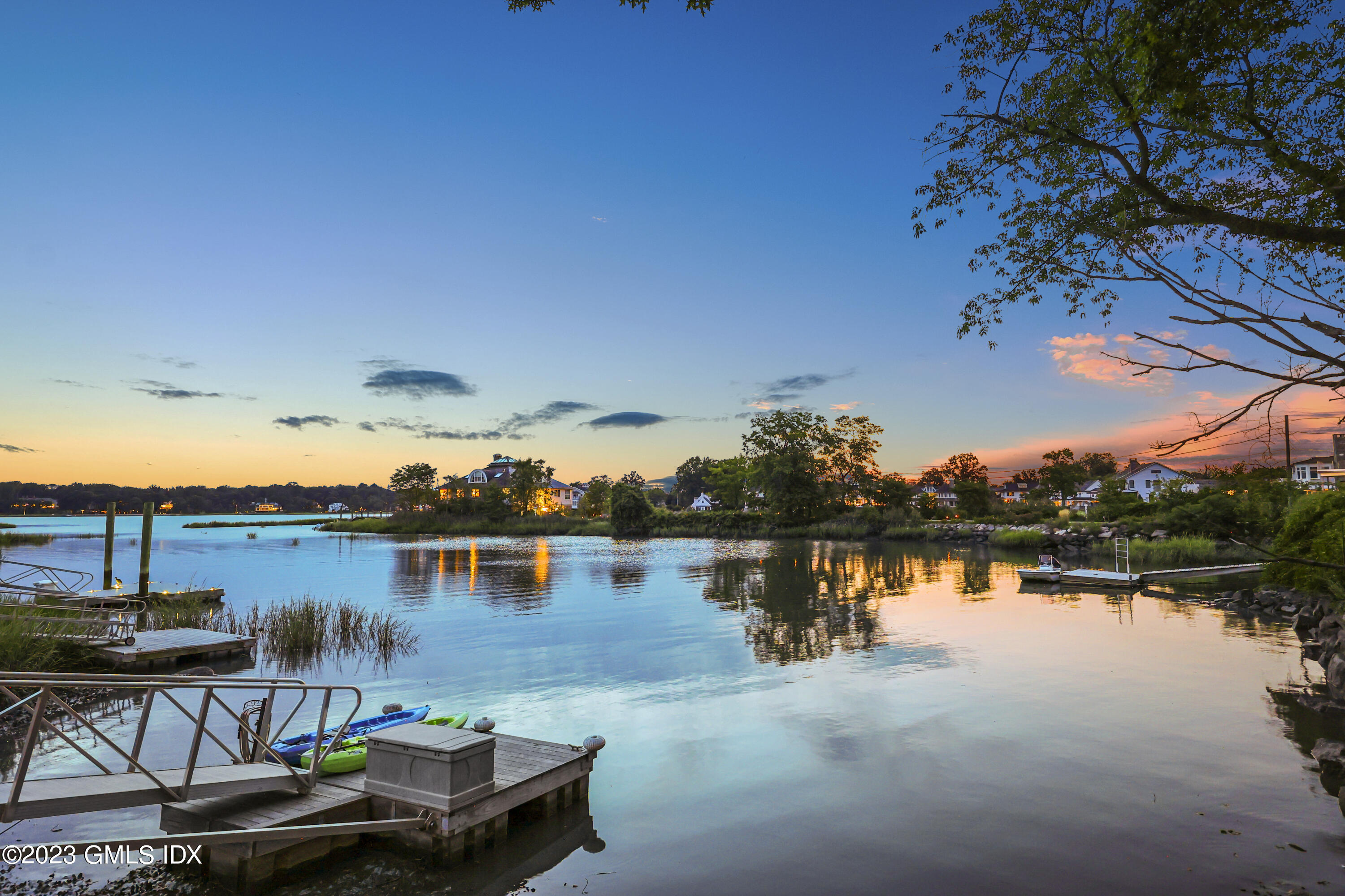195 Shore Road Old Greenwich, CT 06870 - Photo 31 of 39 a view of a lake with sitting area