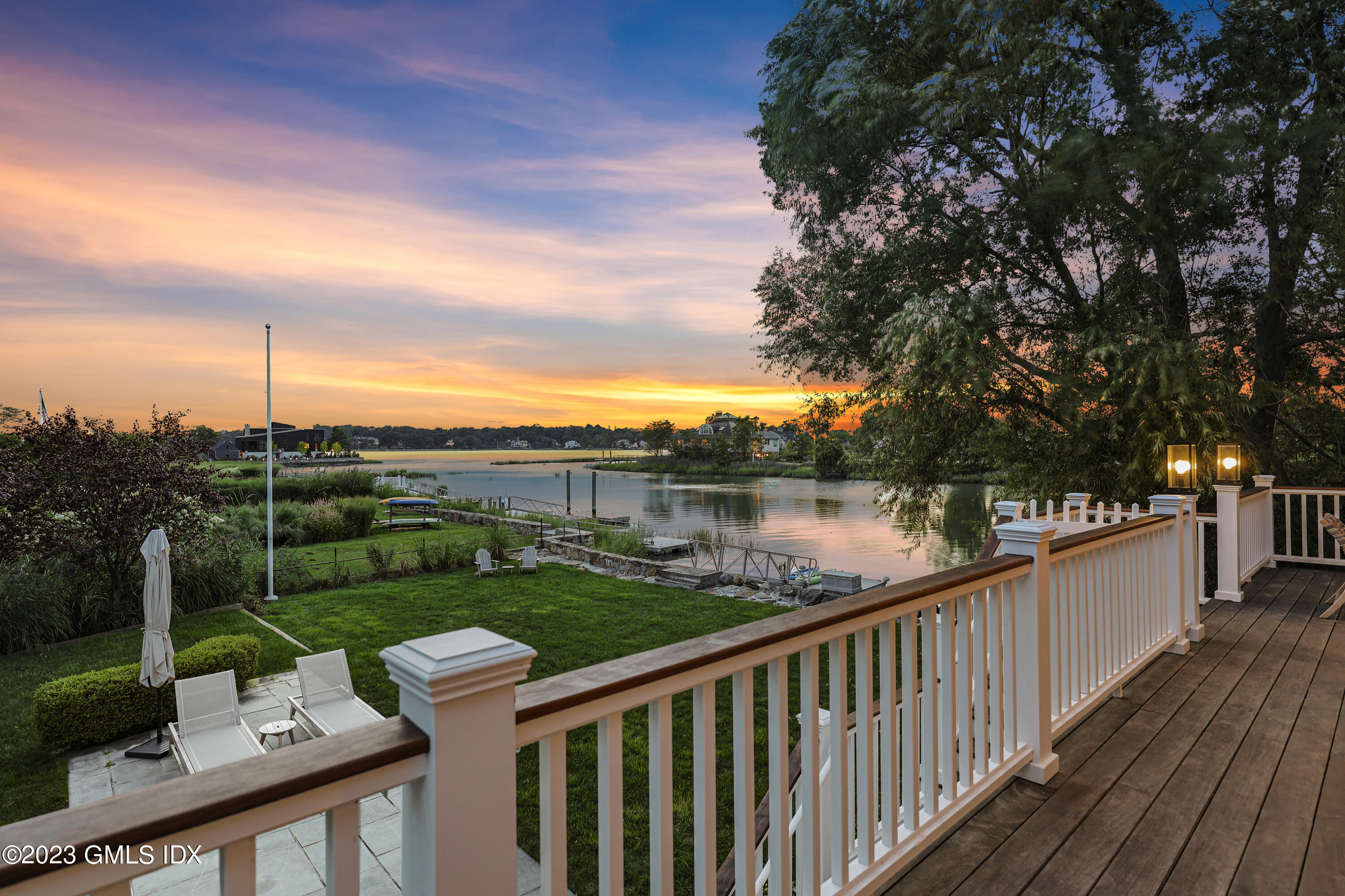 195 Shore Road Old Greenwich, CT 06870 - Photo 33 of 39 a view of a deck with a garden