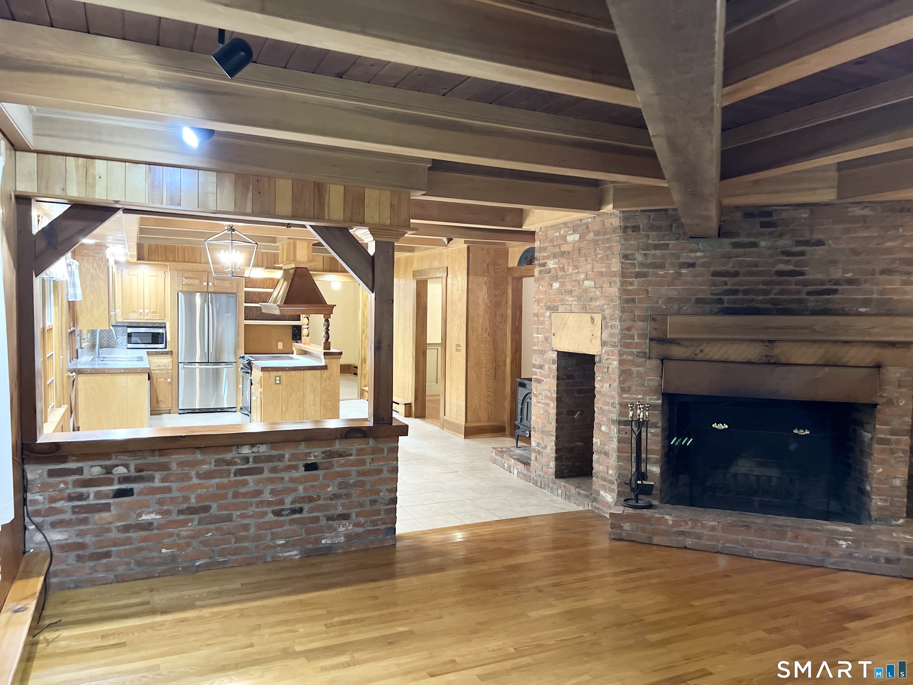 38 Clark Hill Road East Haddam, CT 06423 - Photo 15 of 35 a view of living room with granite countertop furniture and fireplace