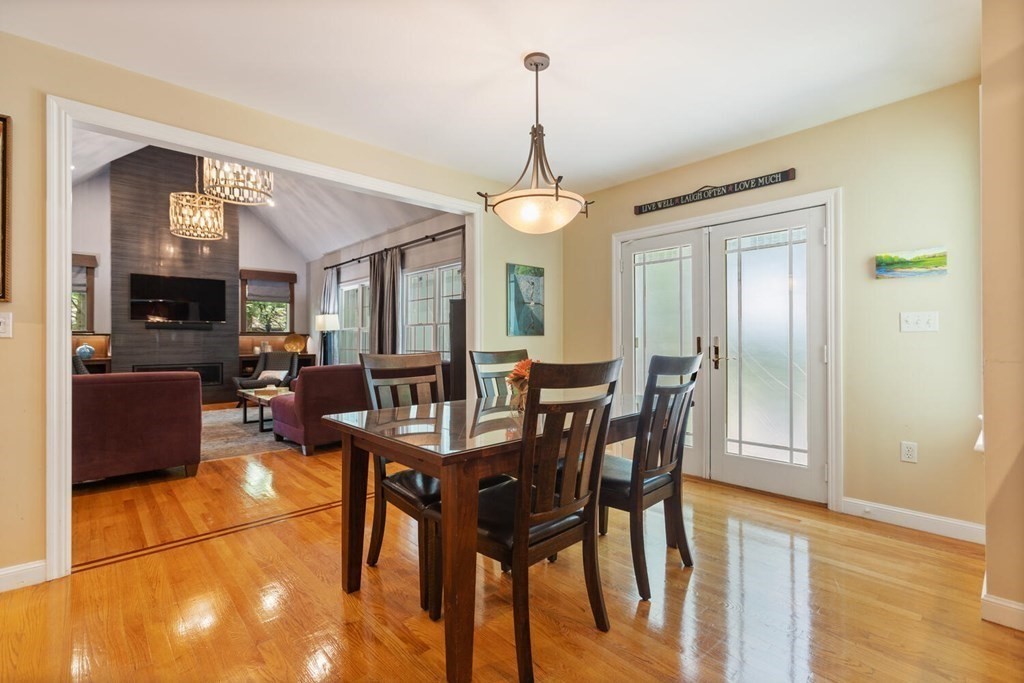 34 Woodcliffe Road Lexington, MA 02421 - Photo 17 of 34 a view of a dining room with furniture and wooden floor