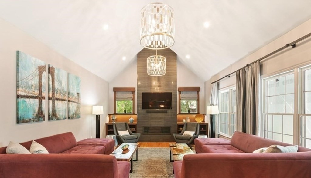 34 Woodcliffe Road Lexington, MA 02421 - Photo 2 of 34 a living room with furniture a large window and a chandelier
