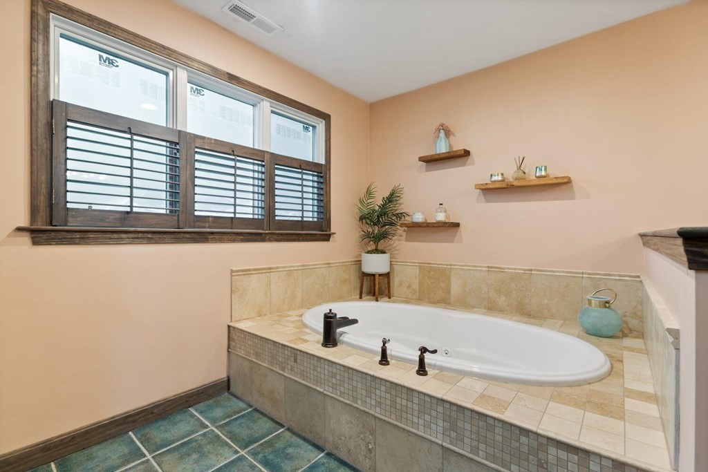 34 Woodcliffe Road Lexington, MA 02421 - Photo 25 of 34 a bathroom with bathtub and window