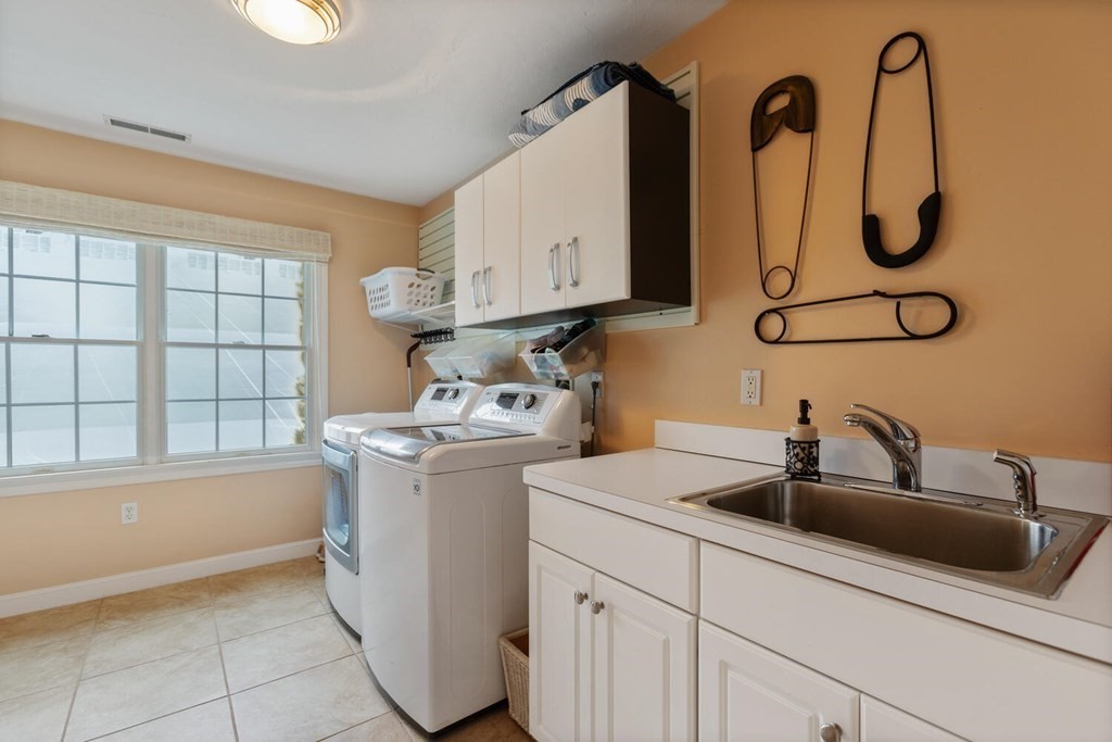 34 Woodcliffe Road Lexington, MA 02421 - Photo 32 of 34 a utility room with dryer and washer