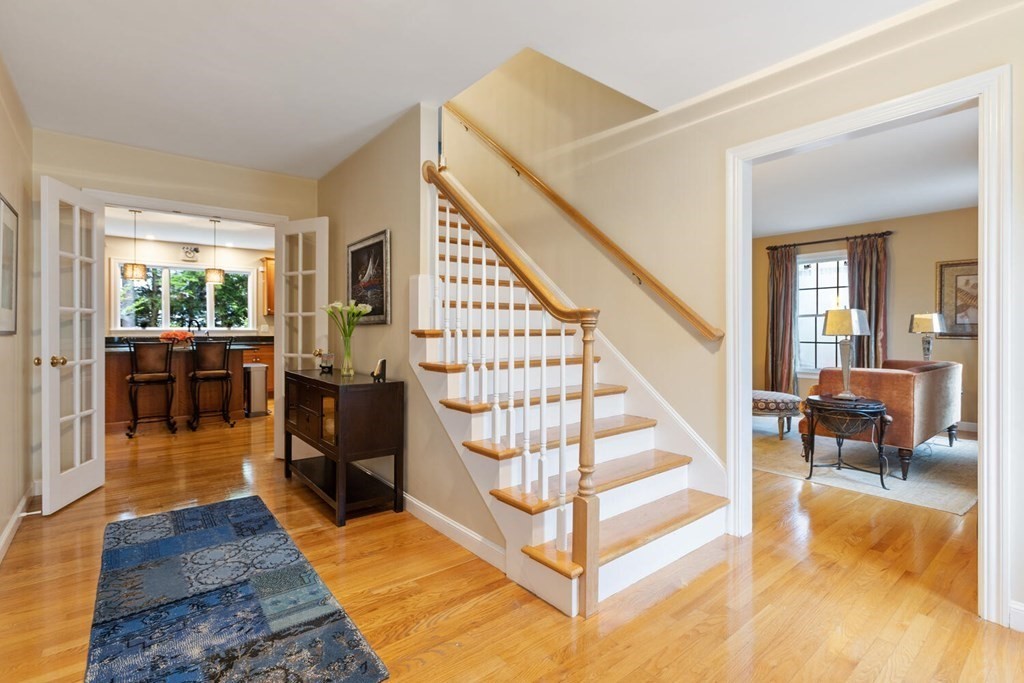 34 Woodcliffe Road Lexington, MA 02421 - Photo 5 of 34 a view of staircase with living room and wooden floor