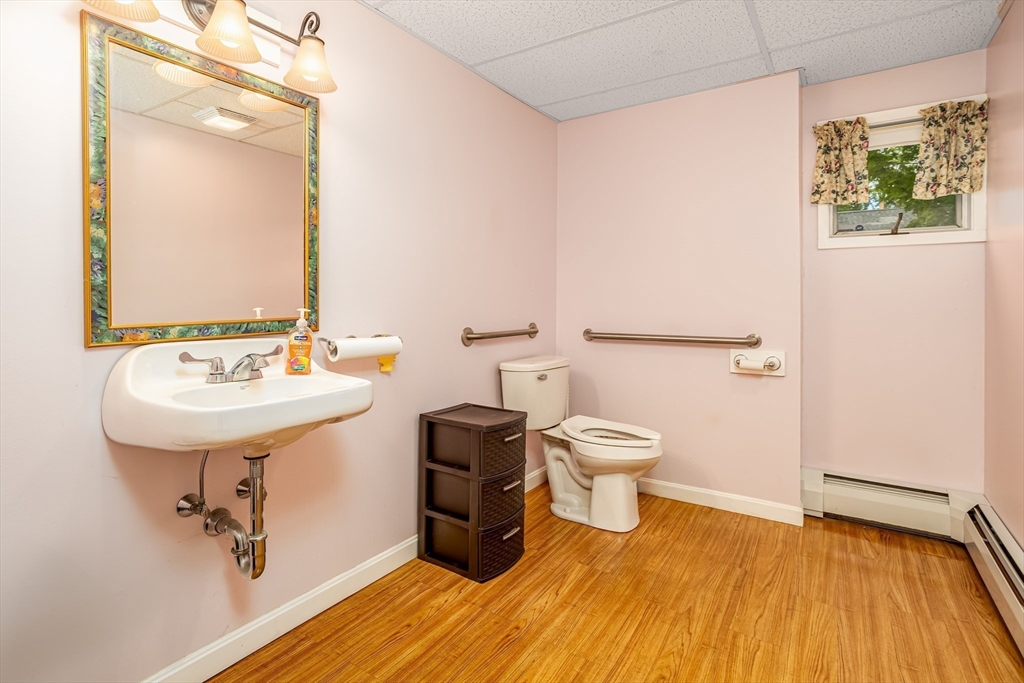 18 North Main Street Templeton, MA 01436 - Photo 15 of 42 a bathroom with a sink toilet and a mirror
