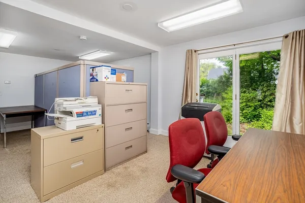a room with furniture and a large window