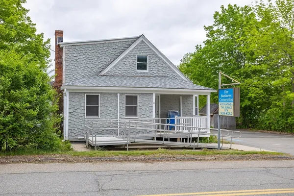 a front view of house with yard outdoor seating and yard