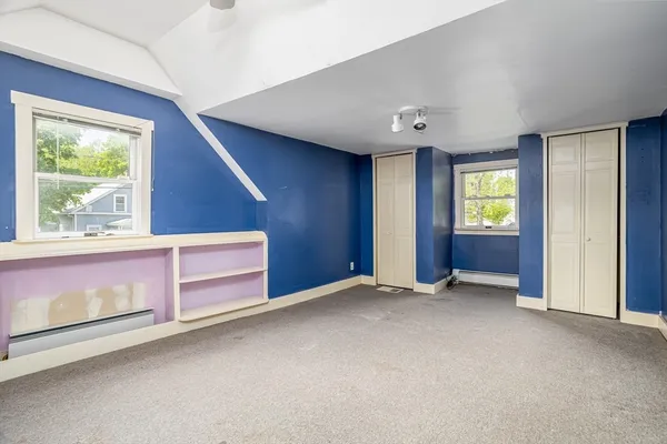 an empty room with windows