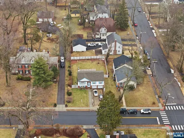 an aerial view of residential house with outdoor space