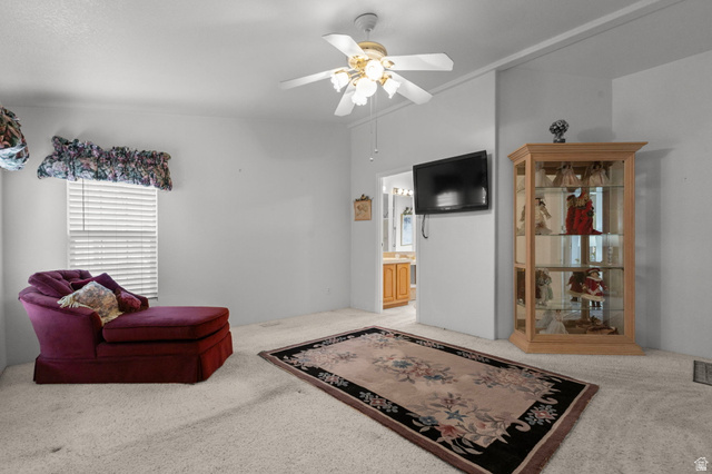 2600 North Hill Field Road, Unit 134 Layton, UT 84041 - Photo 18 of 41 Sitting room featuring light carpet and a ceiling fan