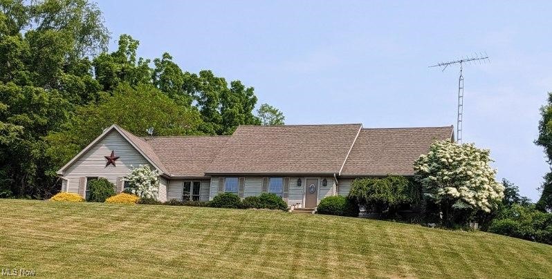 13901 Shaw Mill Road Milan, OH 44846 - Photo 42 of 42 View of front facade featuring a front yard