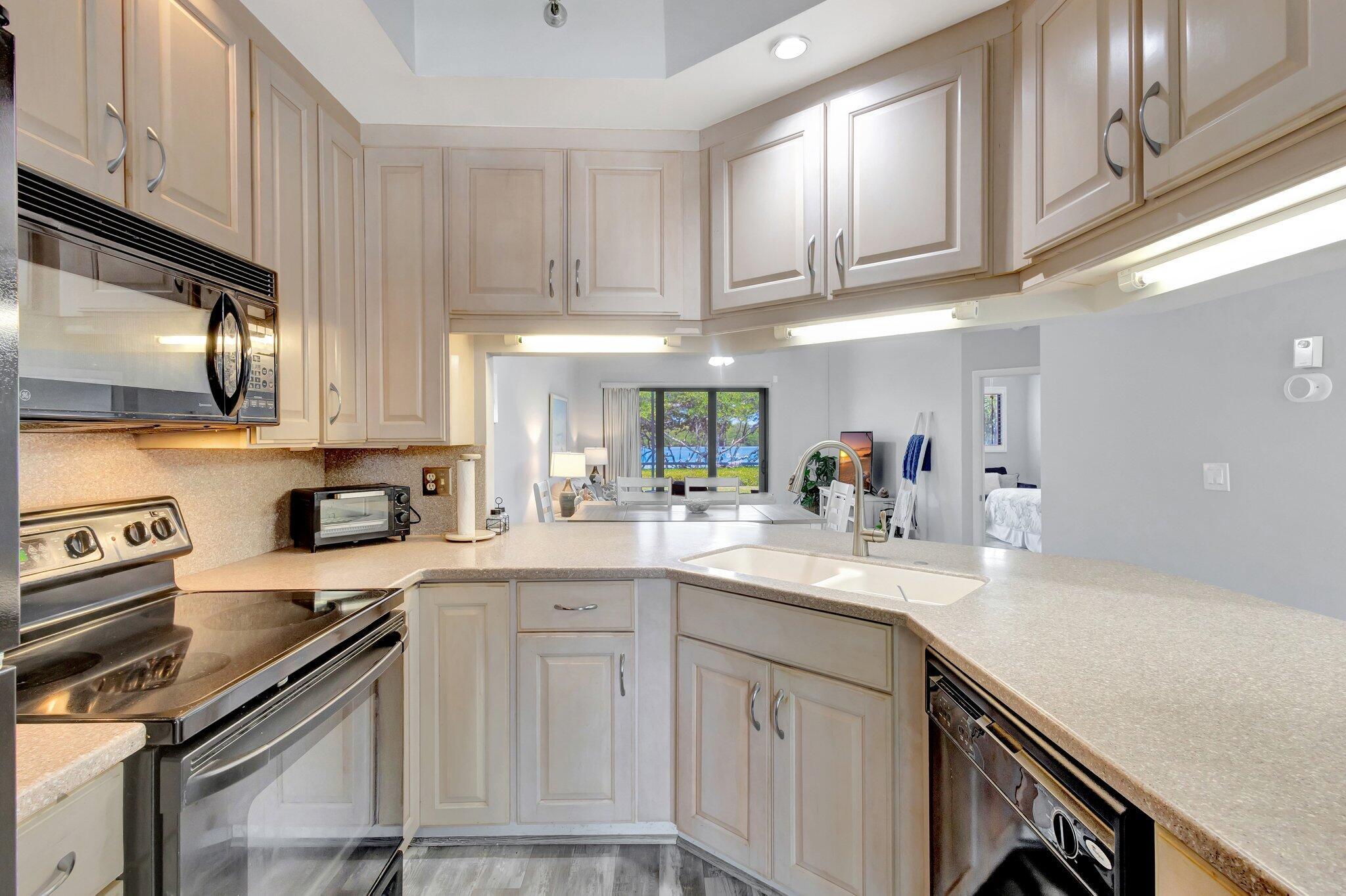200 Waterway Road, Unit 109 Tequesta, FL 33469 - Photo 12 of 43 200 Waterside 109 - Kitchen1