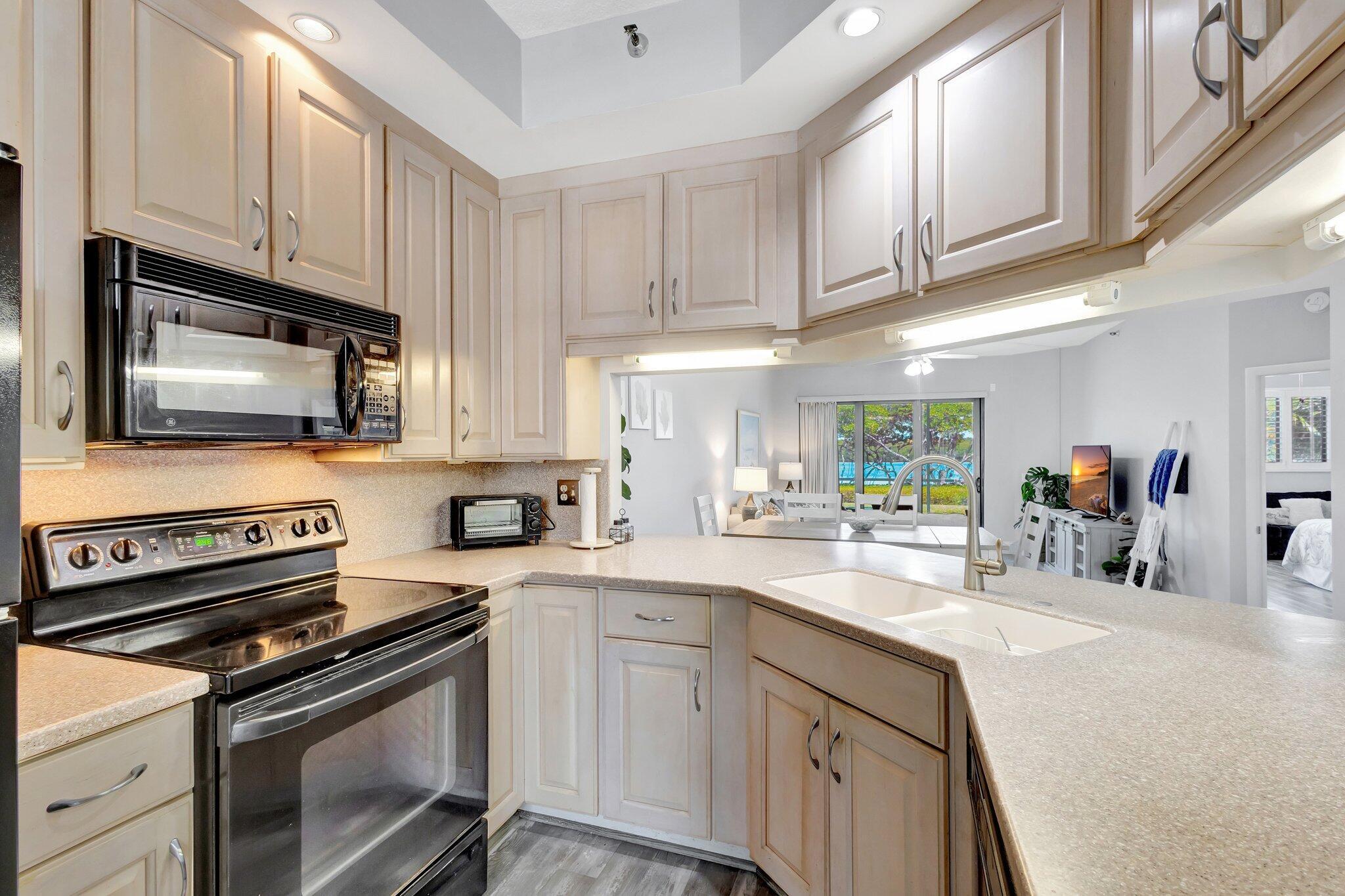 200 Waterway Road, Unit 109 Tequesta, FL 33469 - Photo 13 of 43 200 Waterside 109 - Kitchen2