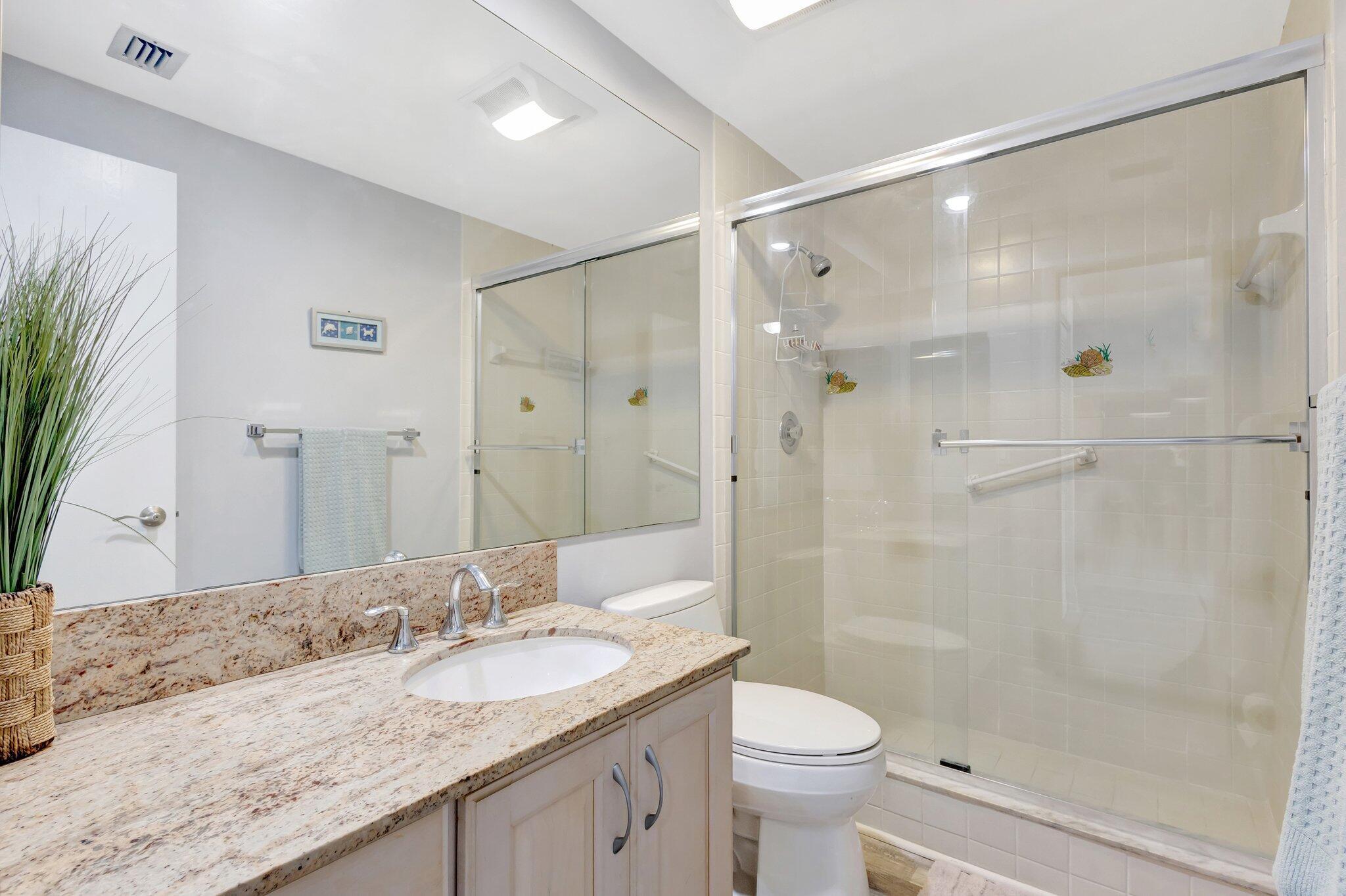 200 Waterway Road, Unit 109 Tequesta, FL 33469 - Photo 29 of 43 200 Waterside 109- Guest Bathroom 1