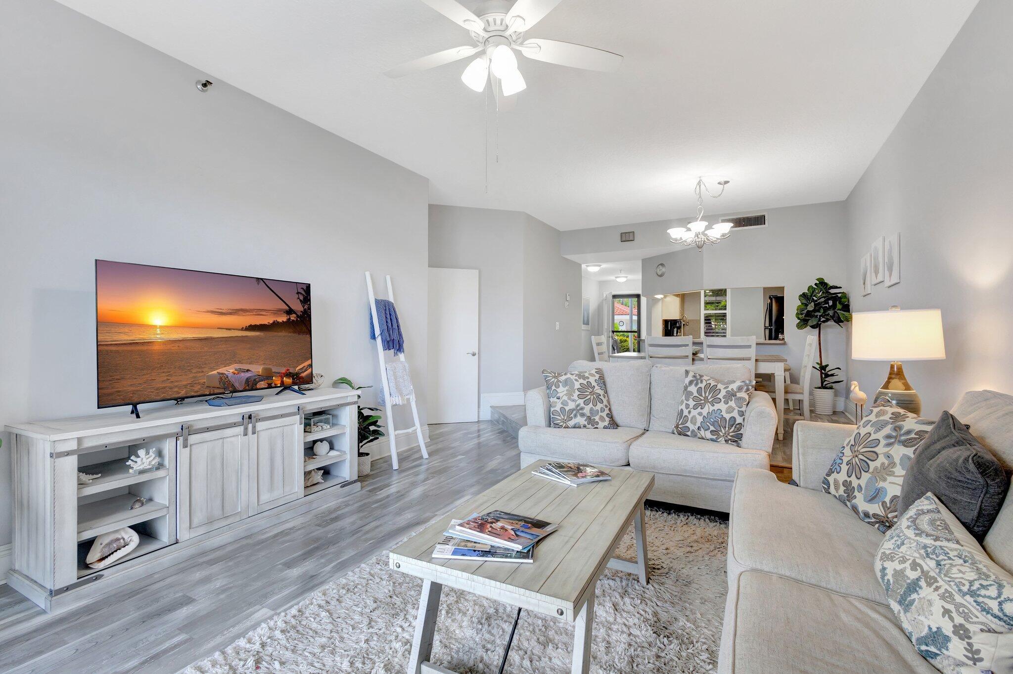 200 Waterway Road, Unit 109 Tequesta, FL 33469 - Photo 4 of 43 200 Waterside 109 - Living Room + Full 1