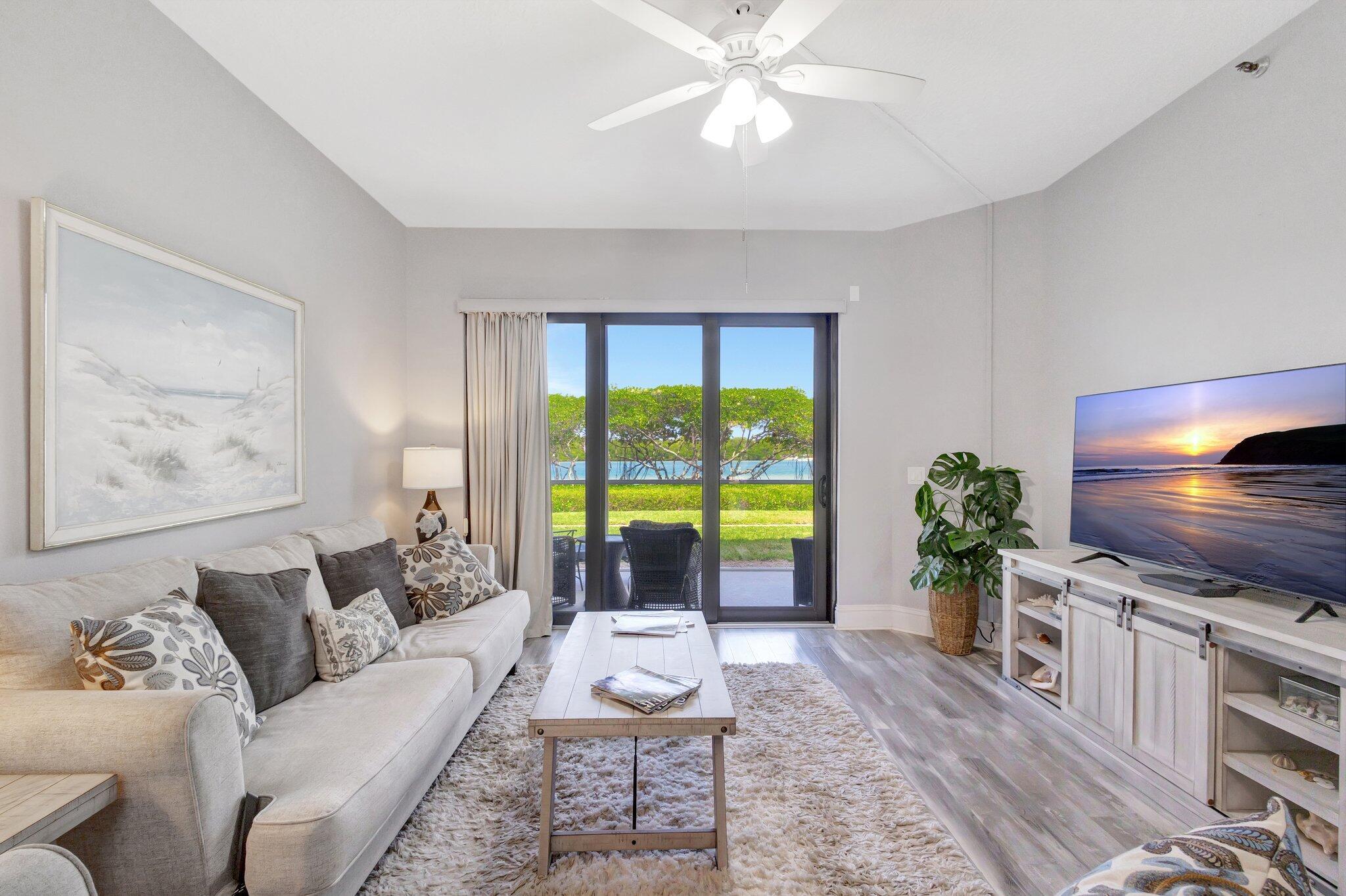 200 Waterway Road, Unit 109 Tequesta, FL 33469 - Photo 6 of 43 200 Waterside - Living Room 2