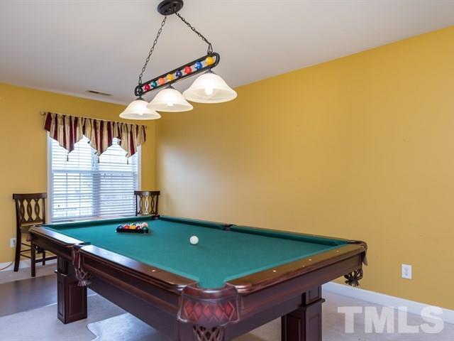 3553 Dewing Drive Raleigh, NC 27616 - Photo 20 of 25 a room with pool table and windows