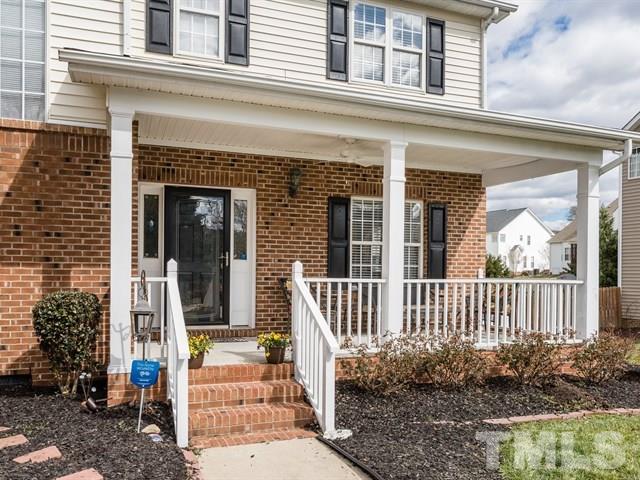 3553 Dewing Drive Raleigh, NC 27616 - Photo 3 of 25 a front view of a house with garden