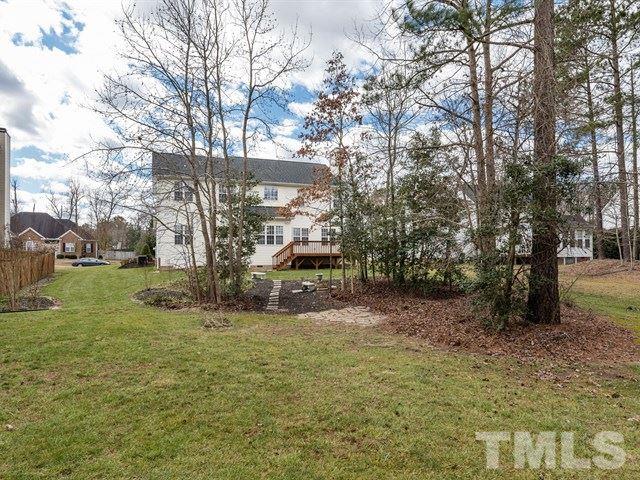 3553 Dewing Drive Raleigh, NC 27616 - Photo 25 of 25 a view of a yard with plants and trees