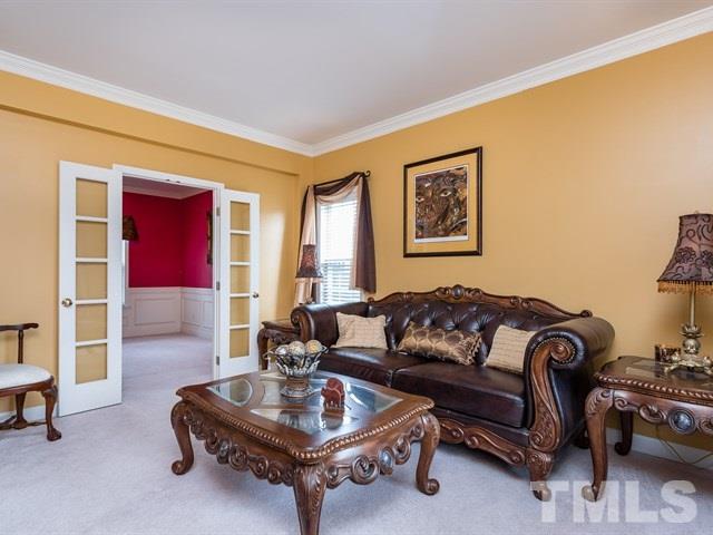3553 Dewing Drive Raleigh, NC 27616 - Photo 6 of 25 a living room with furniture and a window