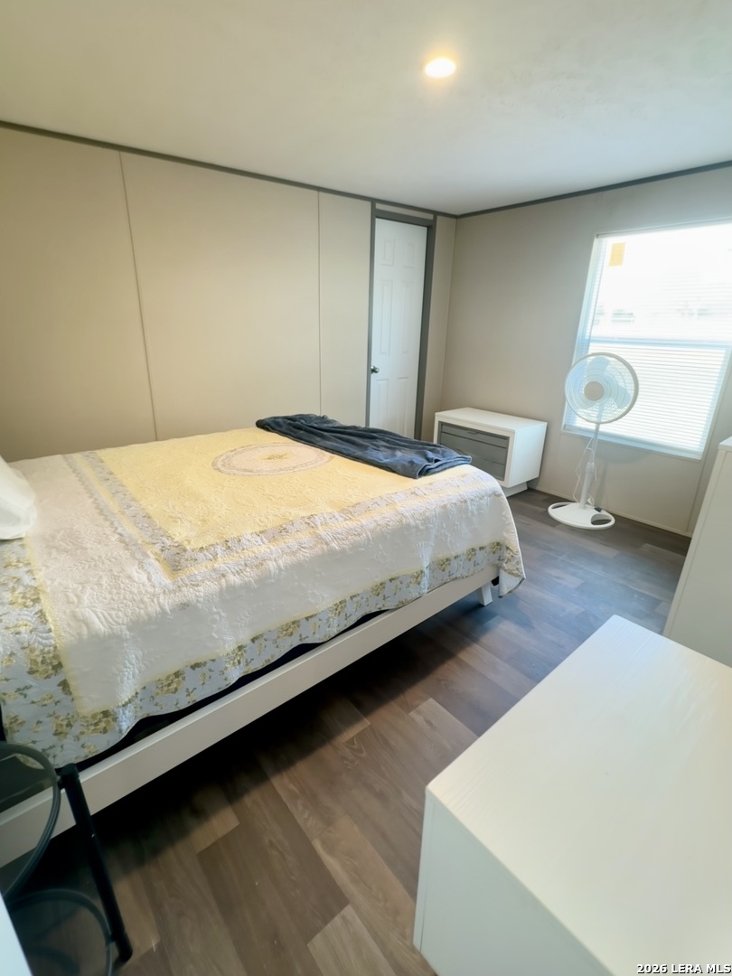 4858 Stanislaus Adkins, TX 78101 - Photo 13 of 19 a bedroom with a bed and a window