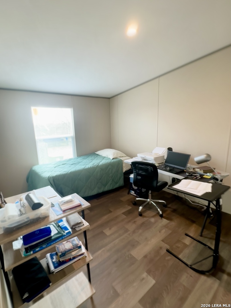 4858 Stanislaus Adkins, TX 78101 - Photo 15 of 19 a room with a window and gym equipment