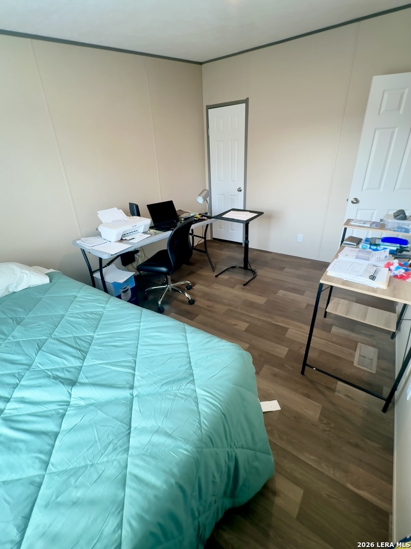 4858 Stanislaus Adkins, TX 78101 - Photo 16 of 19 a bedroom with bed and a window