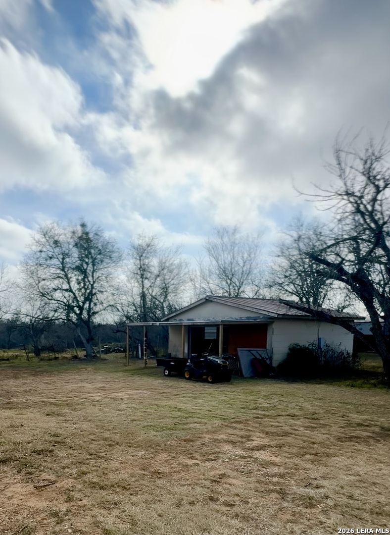 4858 Stanislaus Adkins, TX 78101 - Photo 18 of 19 a view of a house with a yard