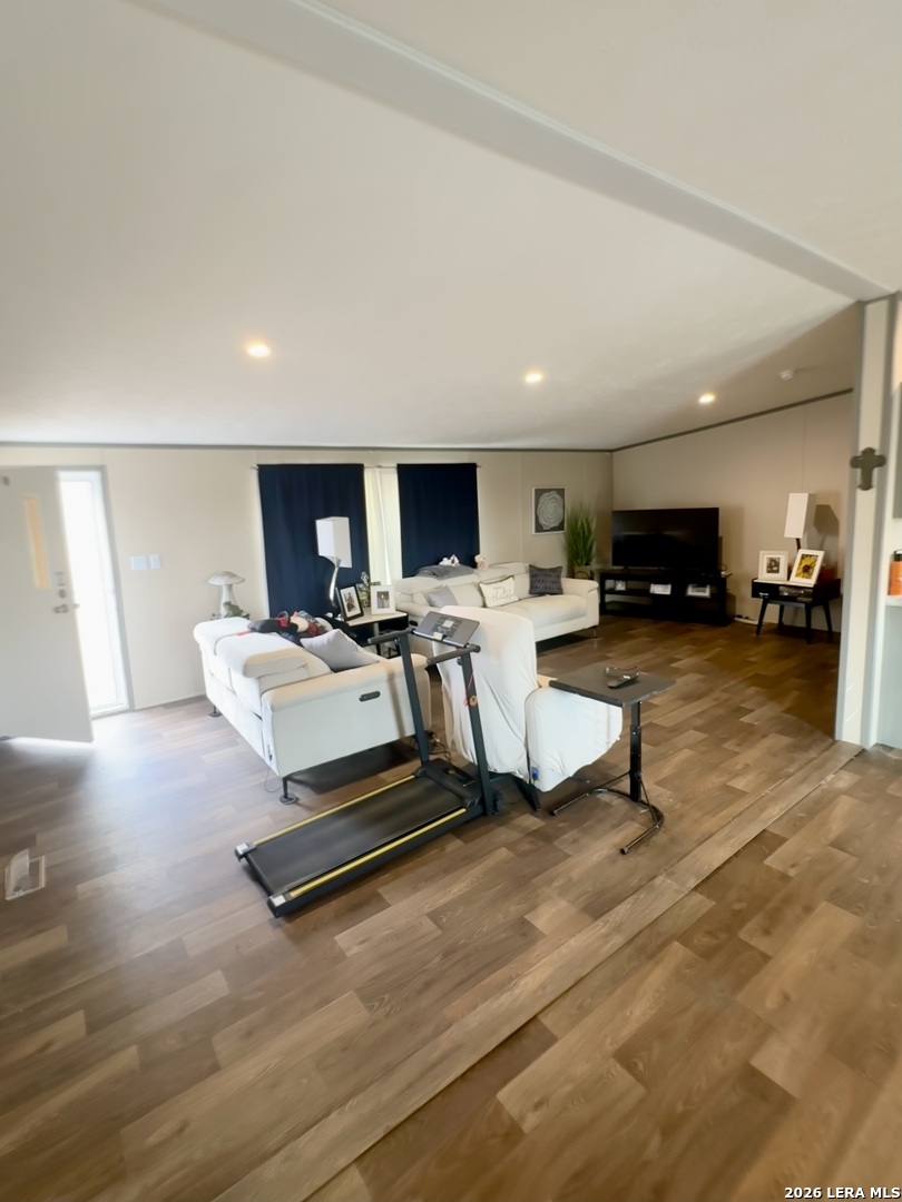4858 Stanislaus Adkins, TX 78101 - Photo 3 of 19 a living room with furniture and a flat screen tv
