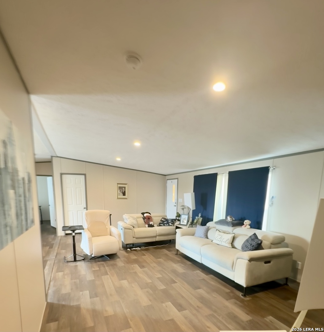 4858 Stanislaus Adkins, TX 78101 - Photo 4 of 19 a living room with furniture and a lamp