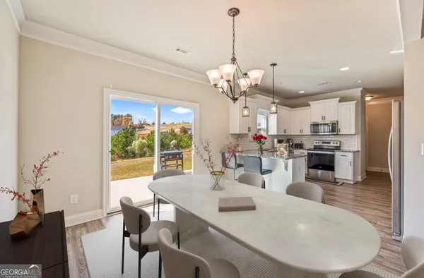 a view of a dining room and livingroom