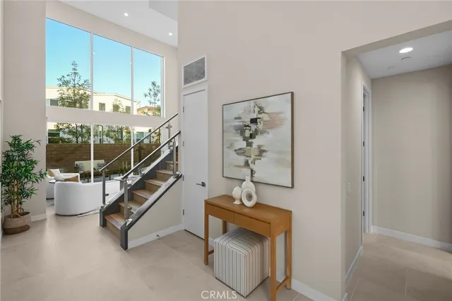 a room with lots of potted plants