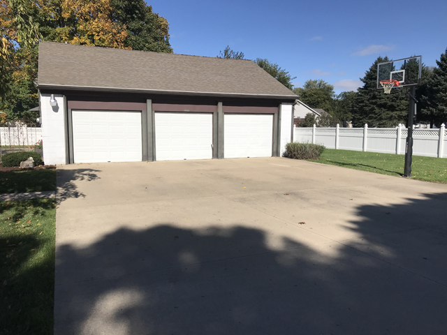 307 Prairie Street Spring Valley, IL 61362 - Photo 2 of 21 a view of empty room with wooden floor and yard in back